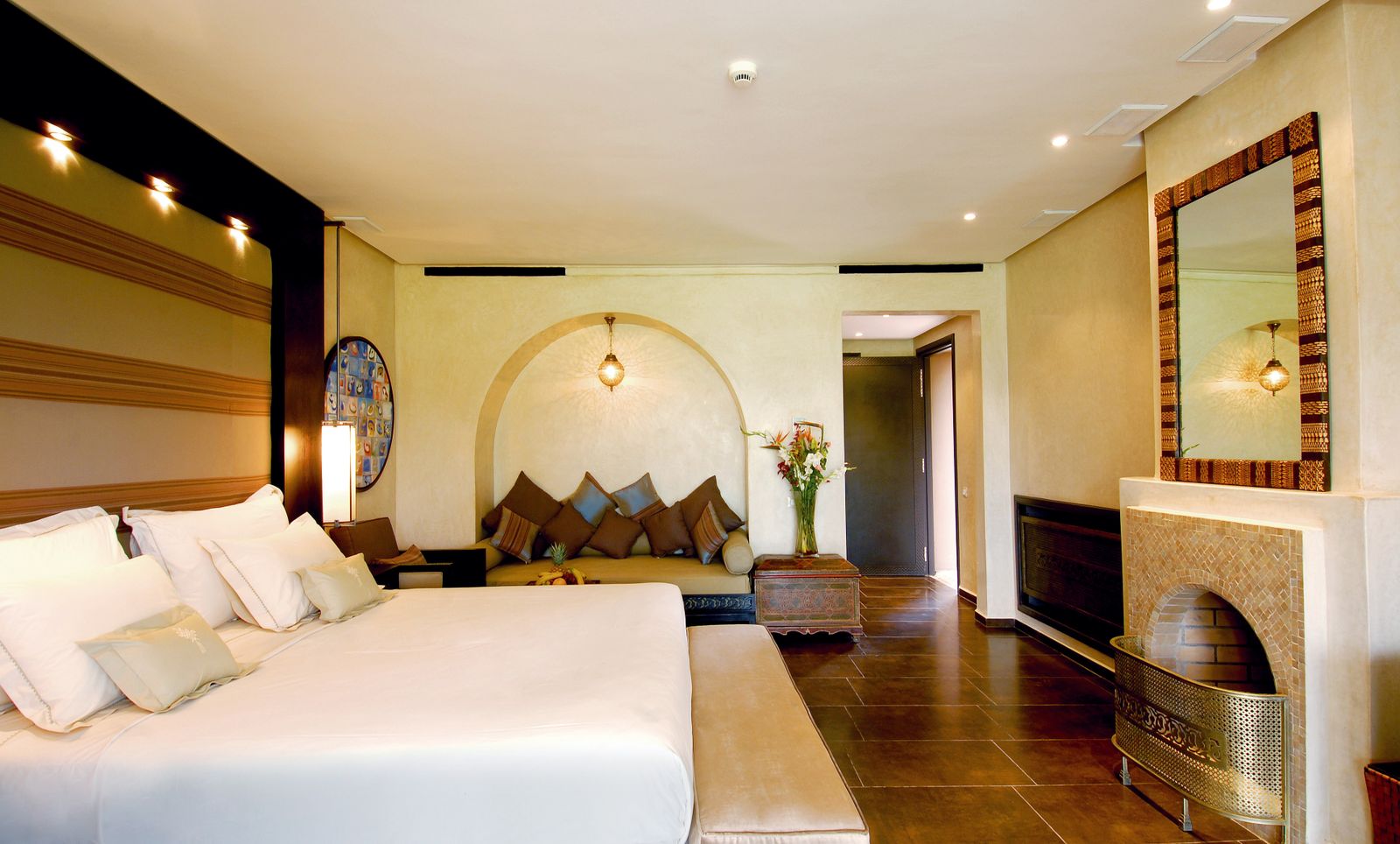 Suite with fireplace and seating area